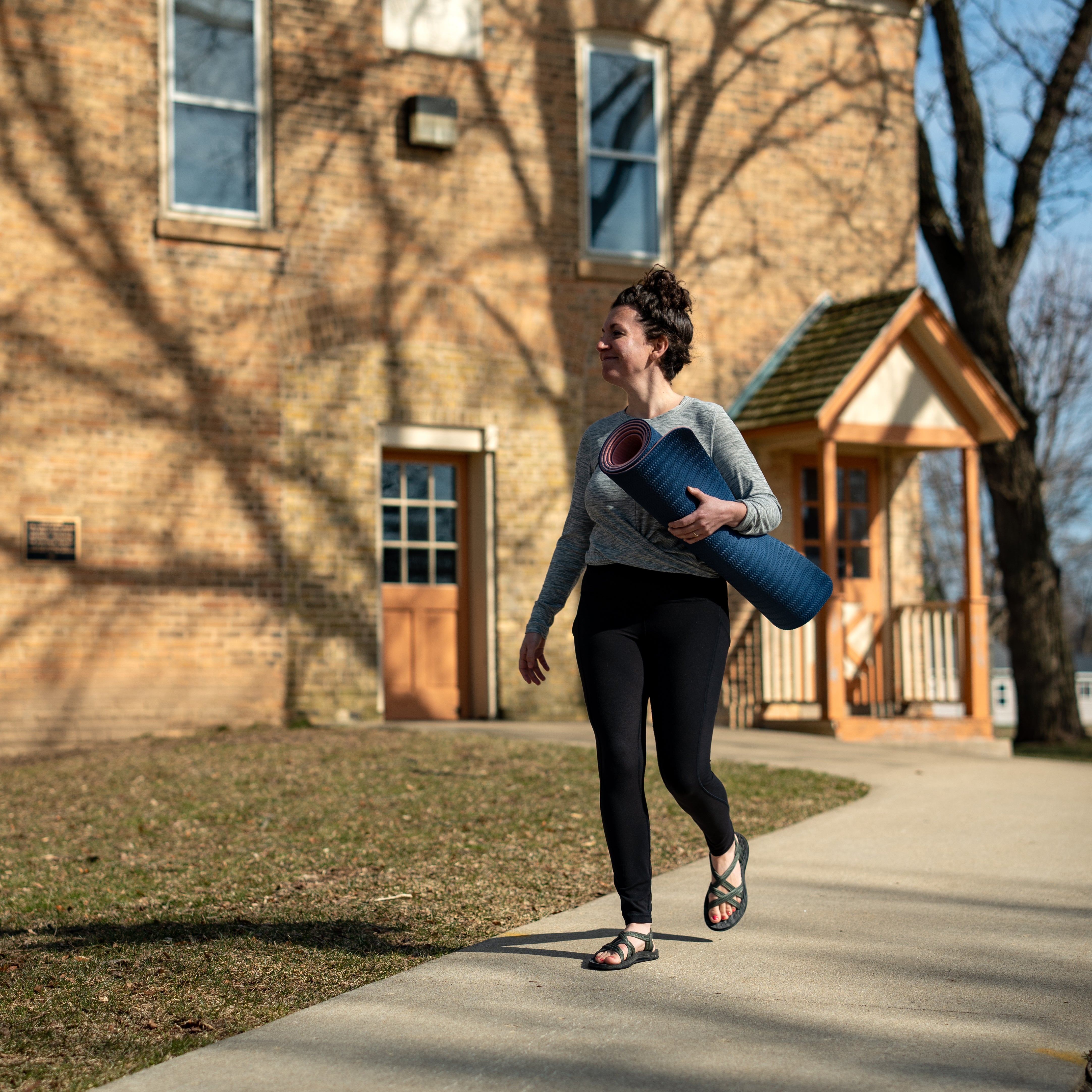 woman walking in her comfort sandals by northside